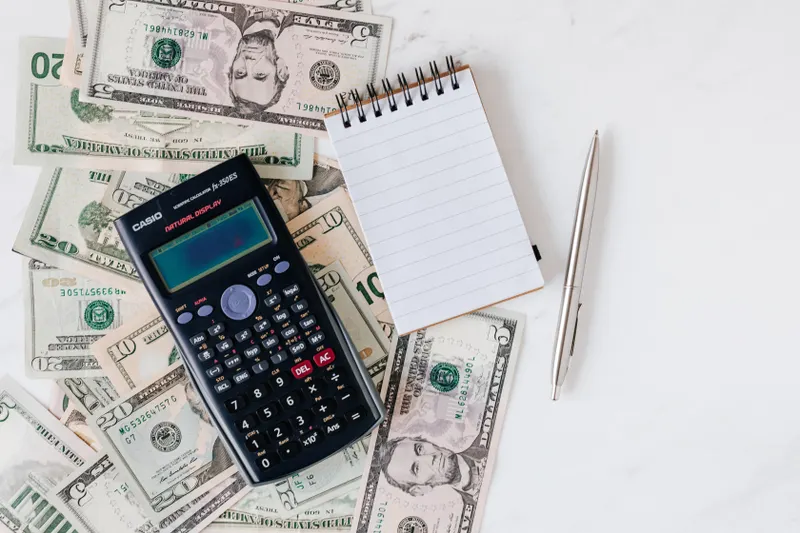 Freelancer reviewing payment terms on a contract document